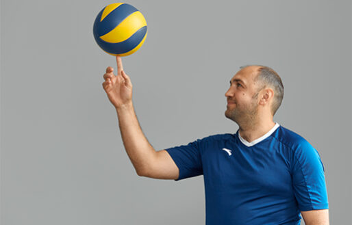 a man with a volleyball ball